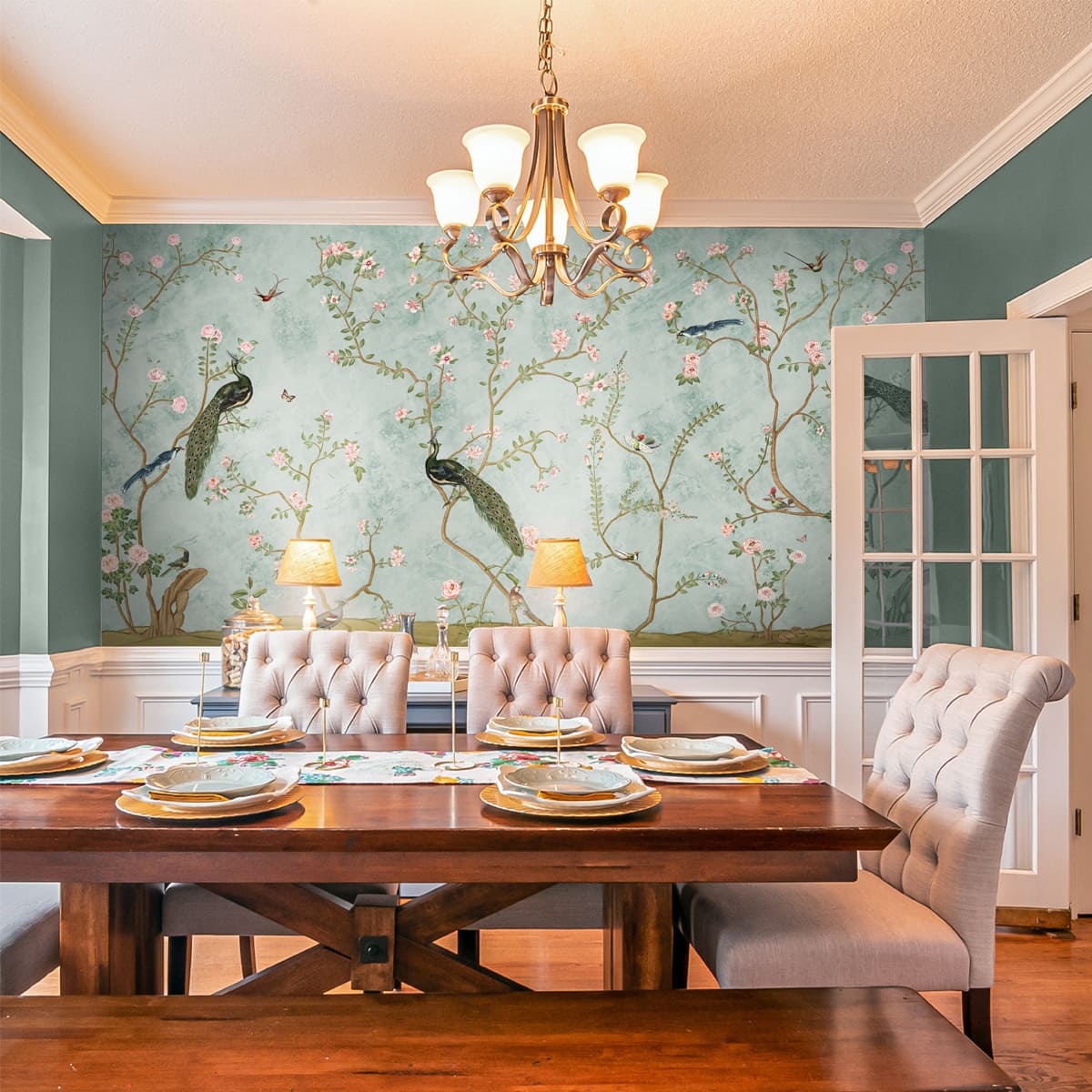 Elegant dining room with botanical wallpaper and warm wood table